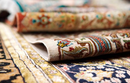 Selective focus image of Persian silk rugs